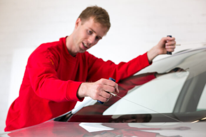 a man rock chip repair in Richmond